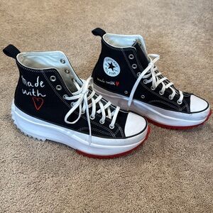 Gently used Black and White High-Top Converse Sneakers